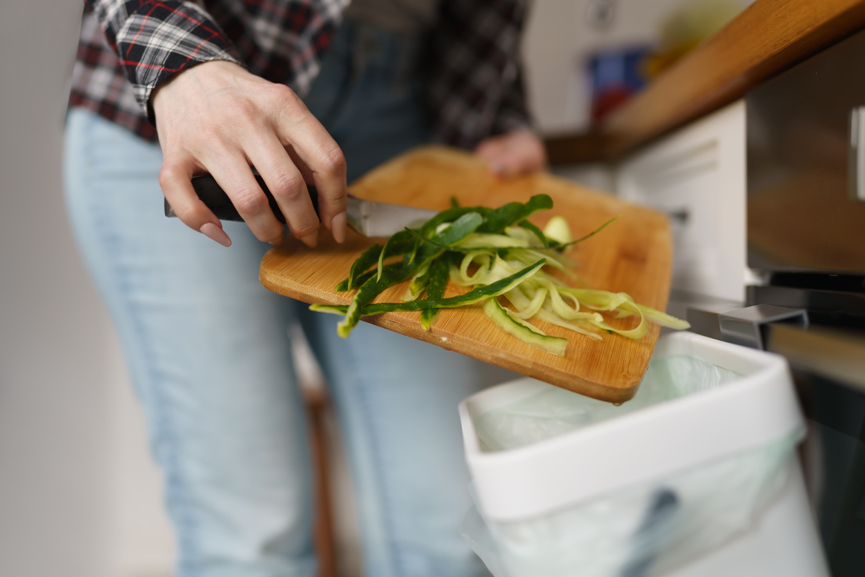 Sustainable lifestyle and zero waste concept. Domestic compost bin being used for fermentation of organic waste