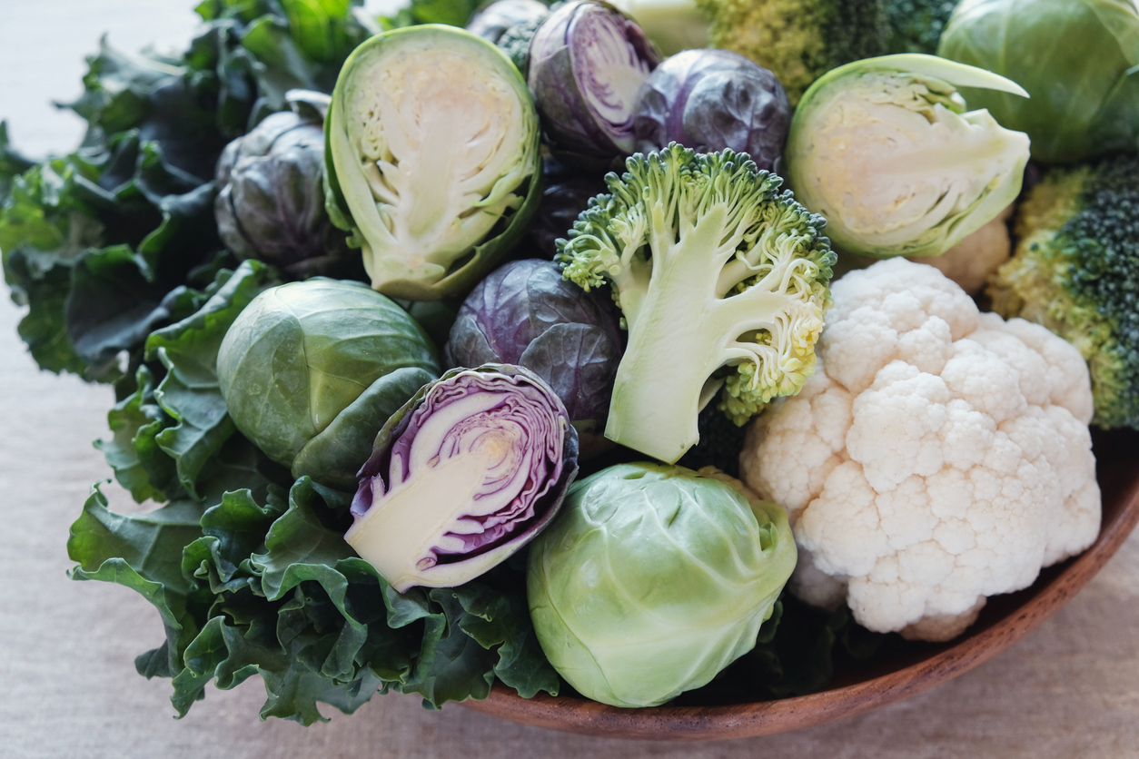 cruciferous vegetables, cauliflower,broccoli, Brussels sprouts, kale in wooden bowl, reducing estrogen dominance, ketogenic diet